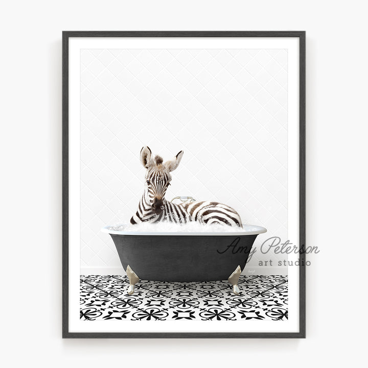 a zebra laying down in a bath tub