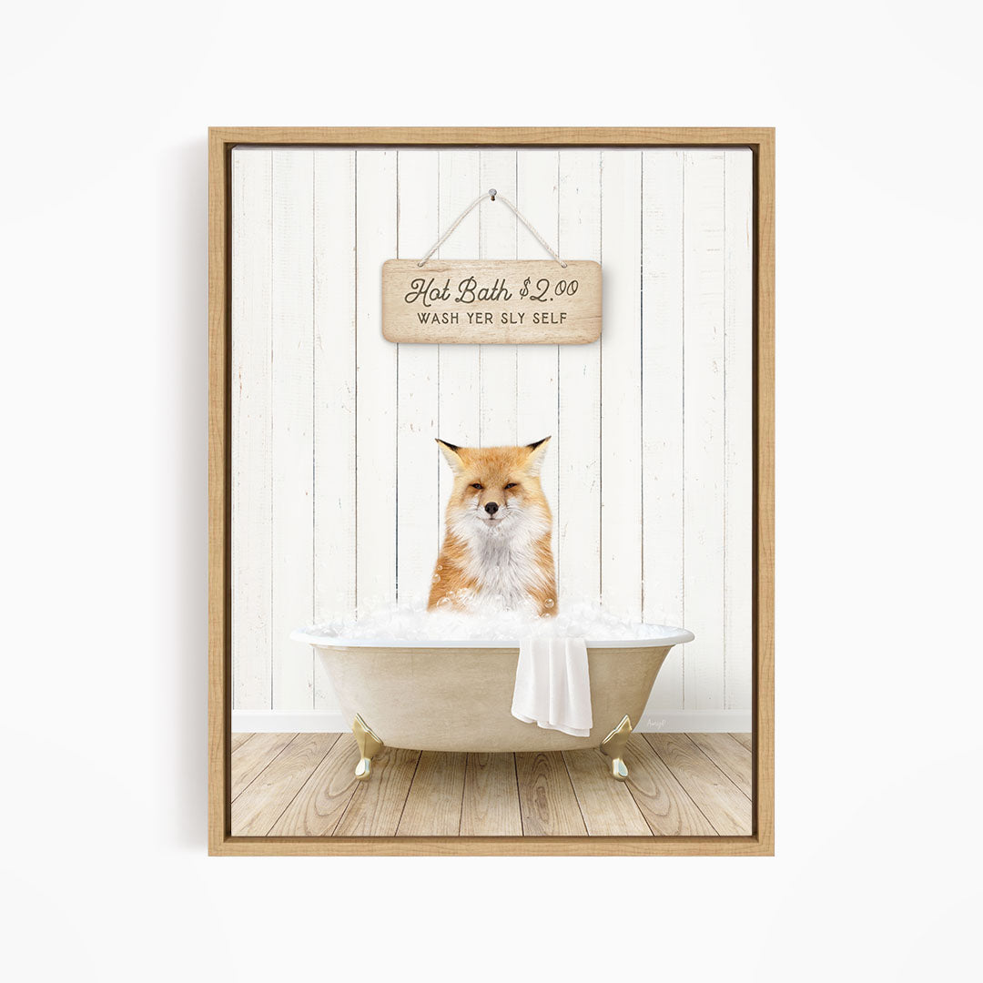 A framed image of a cat sitting in a bathtub, with a sign above it that reads "Hot Bath $2.00 WASH YOUR SELF".