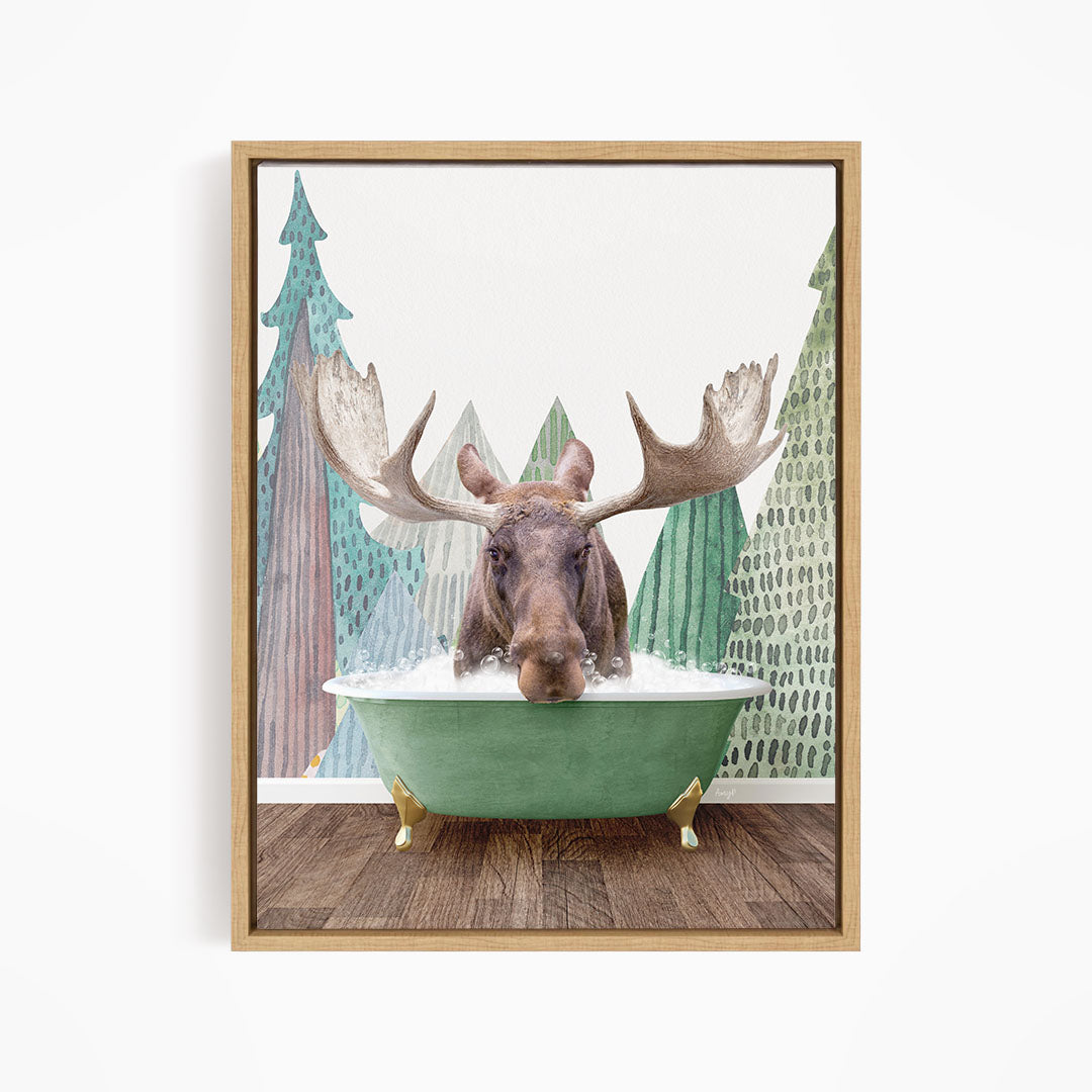 A moose is sitting in a green bathtub, surrounded by a forest scene with trees and a snowy landscape.