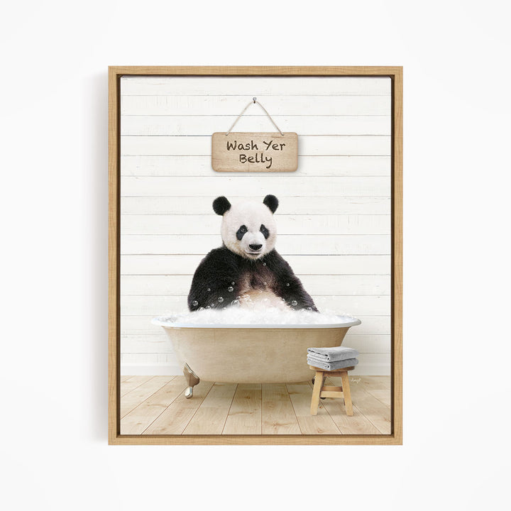 A panda bear sitting in a bathtub, with a sign above that says "Wash Your Belly".