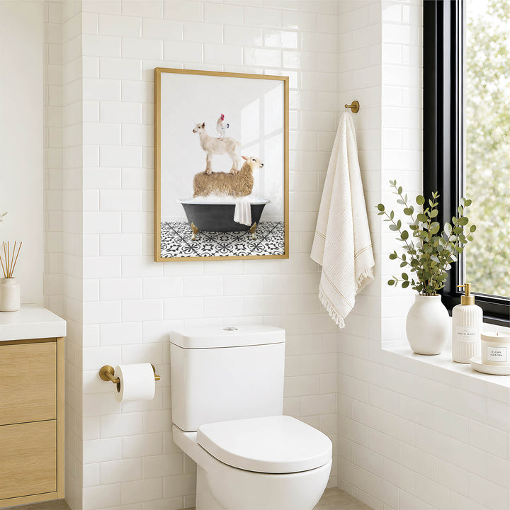 a bathroom with a white toilet, a framed picture of a chicken in a bathtub, and a window with greenery on the sill.