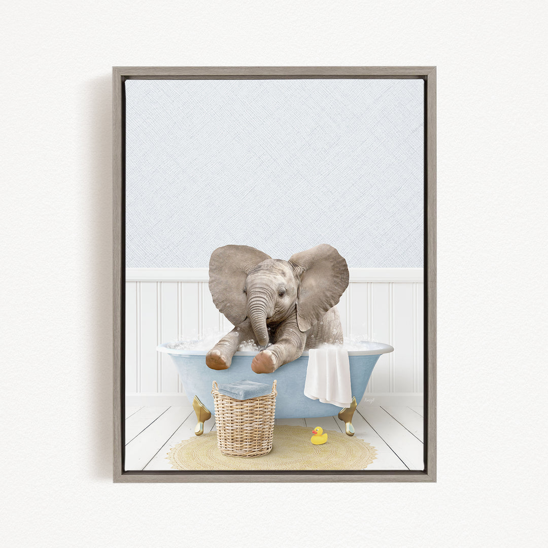 A gray elephant sitting in a blue bathtub, surrounded by a yellow rubber duck and a basket.
