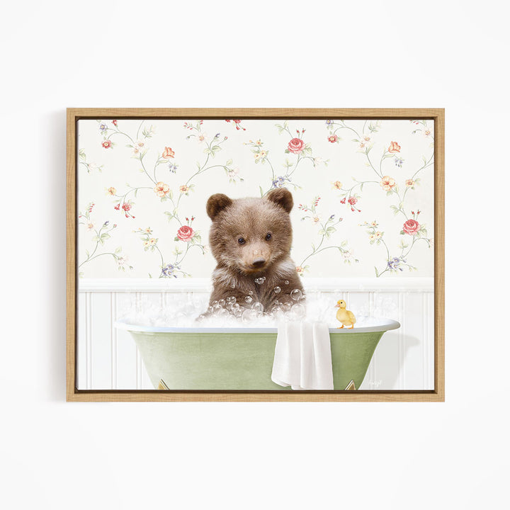 A cute brown bear sitting in a green bathtub filled with bubbles, with a yellow duck floating nearby.