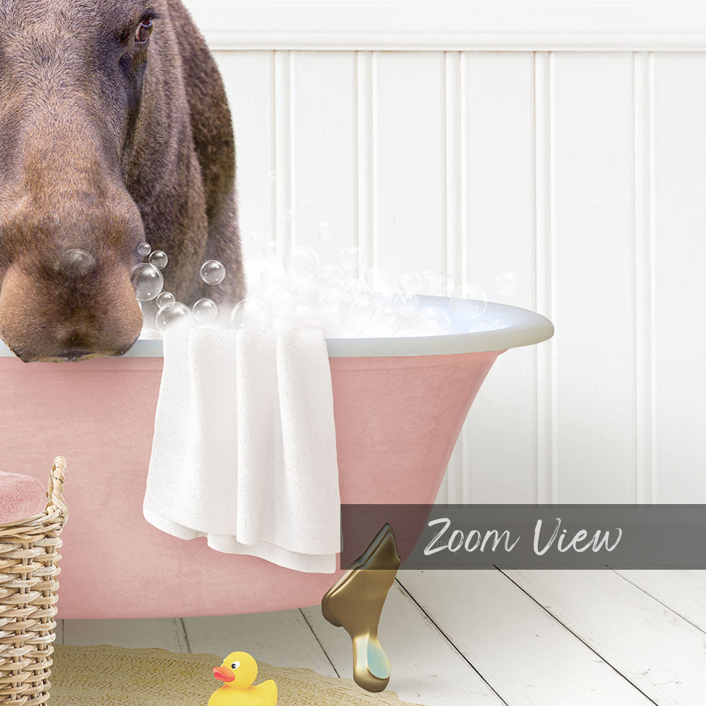 A dog is sitting in a pink bathtub filled with bubbles, surrounded by a yellow rubber duck and a white towel.