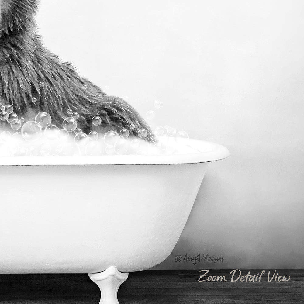 A fluffy gray cat is sitting in a white bathtub filled with bubbles, creating a cozy and relaxing scene.