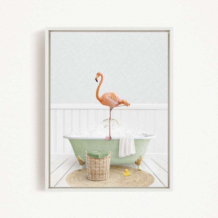 A pink flamingo stands on the edge of a green bathtub filled with bubbles, surrounded by a basket, a yellow rubber duck, and a white towel.