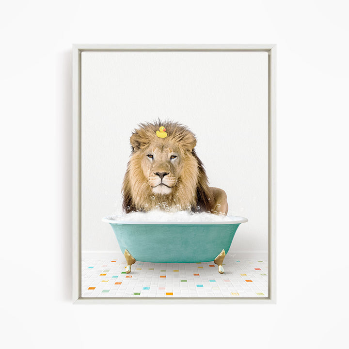 A lion is sitting in a blue bathtub filled with bubbles, with a rubber duck floating on its head.