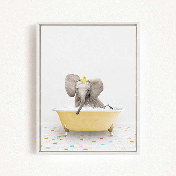 A baby elephant sitting in a yellow bathtub, with a rubber duck on its head, enjoying a bath.
