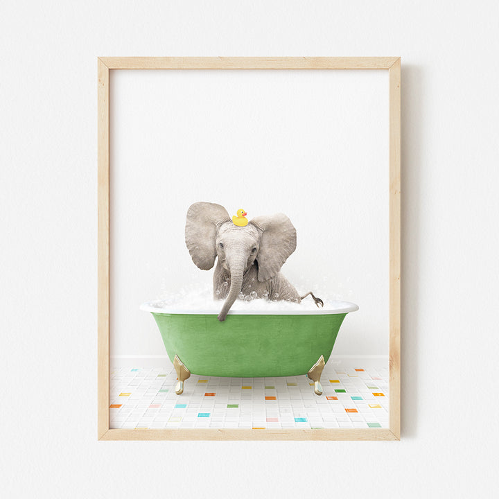 an elephant taking a bath in a green bathtub