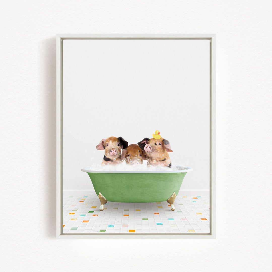 Three adorable pigs sitting in a green bathtub, with one of them wearing a yellow hat.