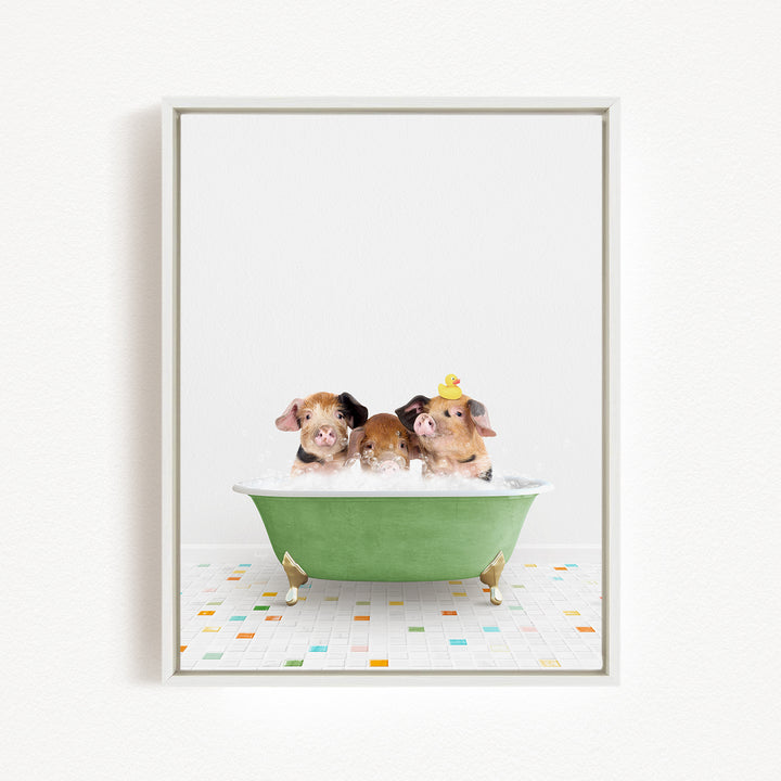 Three adorable pigs sitting in a green bathtub, with one of them wearing a yellow hat.