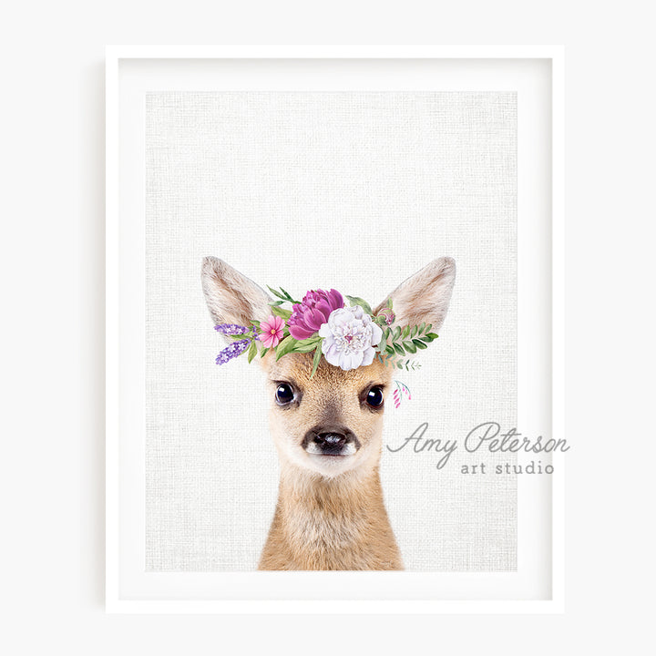 a picture of a deer wearing a flower crown