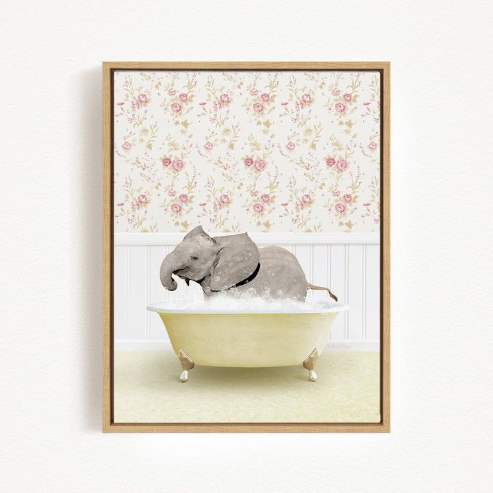A gray elephant is sitting in a yellow bathtub filled with water, surrounded by a floral wallpaper.