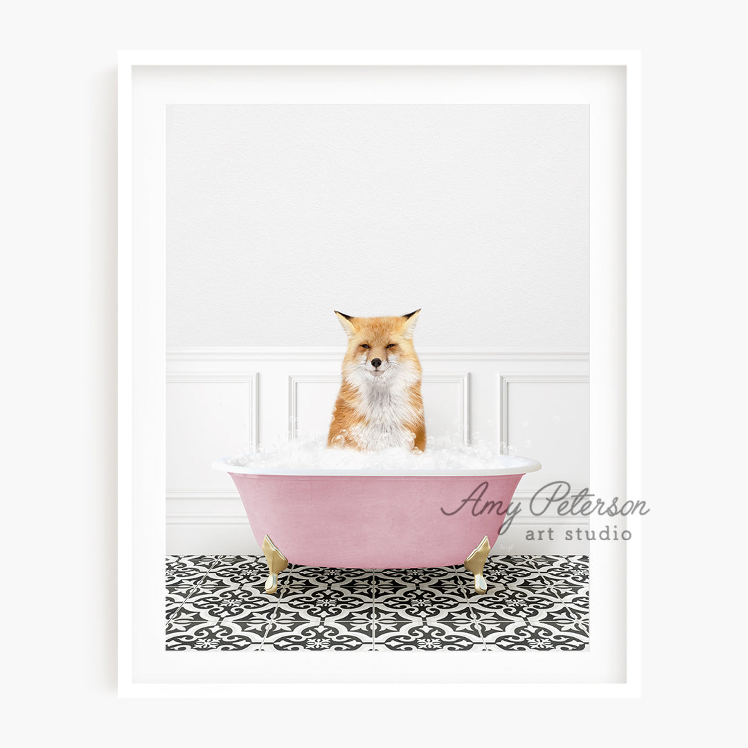 a dog sitting in a pink bath tub