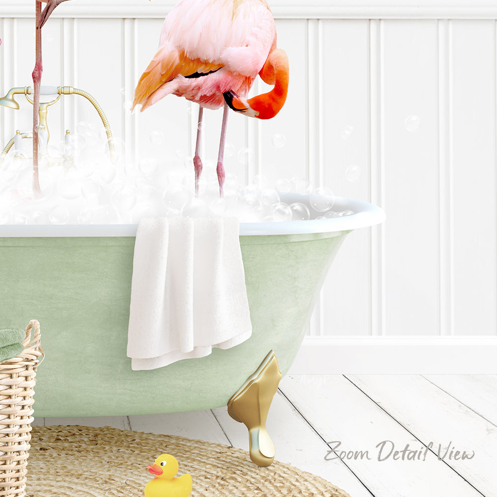 A pink flamingo stands in a green bathtub filled with bubbles, surrounded by a yellow rubber duck and a white towel.