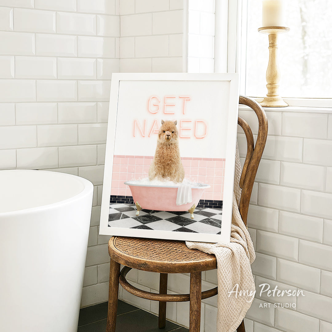 A framed image of a dog sitting in a pink bathtub, with the text "GET NAUNTED" displayed on the frame.