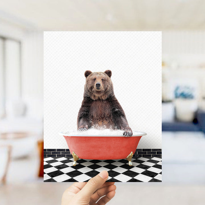A brown bear sitting in a red bathtub filled with water, with a black and white checkered floor in the background.