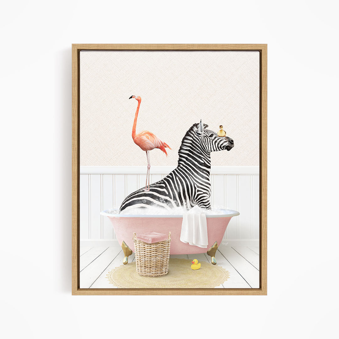 A zebra is sitting in a pink bathtub, with a flamingo standing on its back and a basket of rubber ducks nearby.