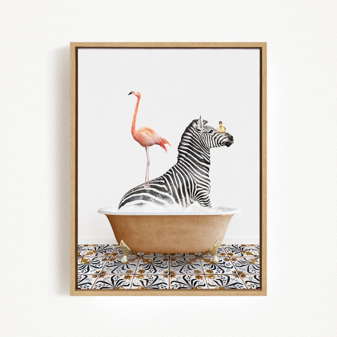 A framed image depicting a zebra standing in a bathtub with a pink flamingo, both appearing to be enjoying a relaxing bath together.