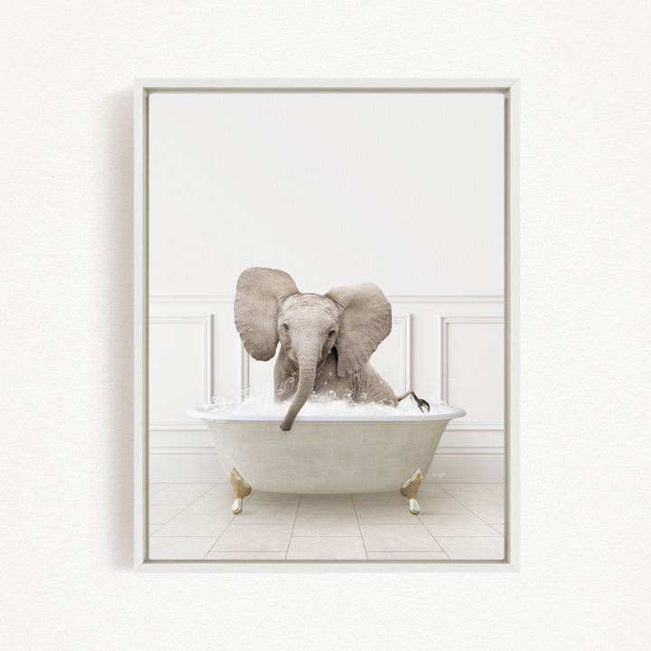 A baby elephant sitting in a white bathtub filled with water, enjoying a bath.