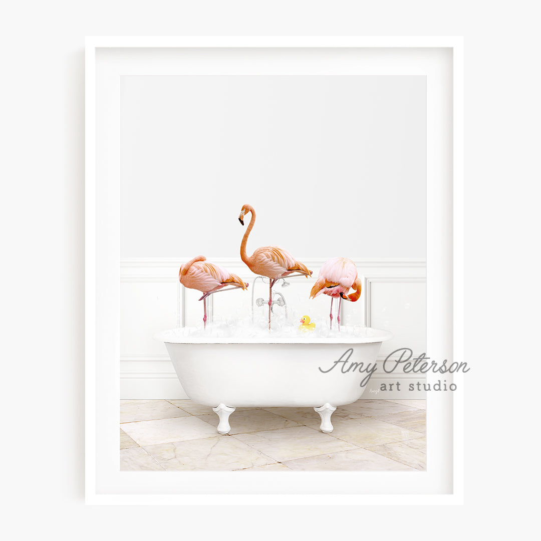 a group of flamingos in a bathtub with bubbles