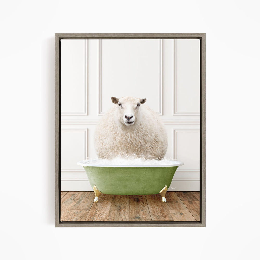 A fluffy white sheep sits in a green bathtub filled with bubbles, looking directly at the camera.