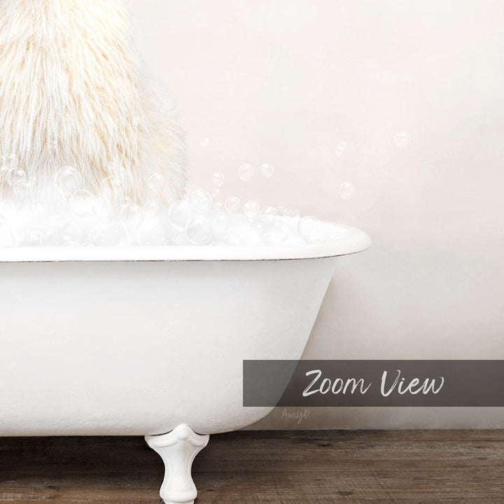 A fluffy white dog sitting in a white bathtub filled with bubbles, with the text "Zoom View" overlaid on the image.