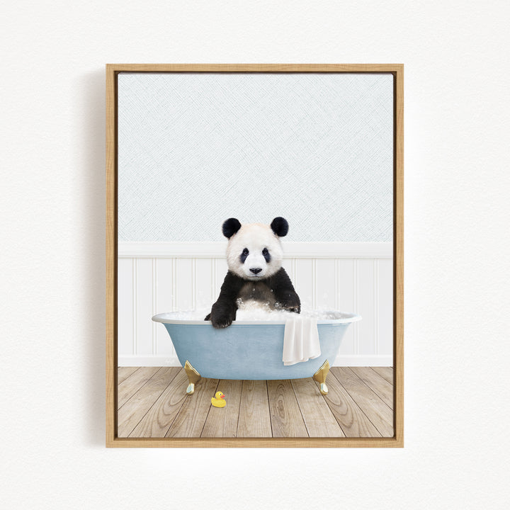 A panda bear sitting in a blue bathtub filled with bubbles, surrounded by rubber ducks.