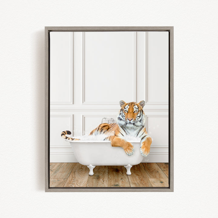 A tiger is sitting in a white bathtub, appearing relaxed and enjoying the bath.