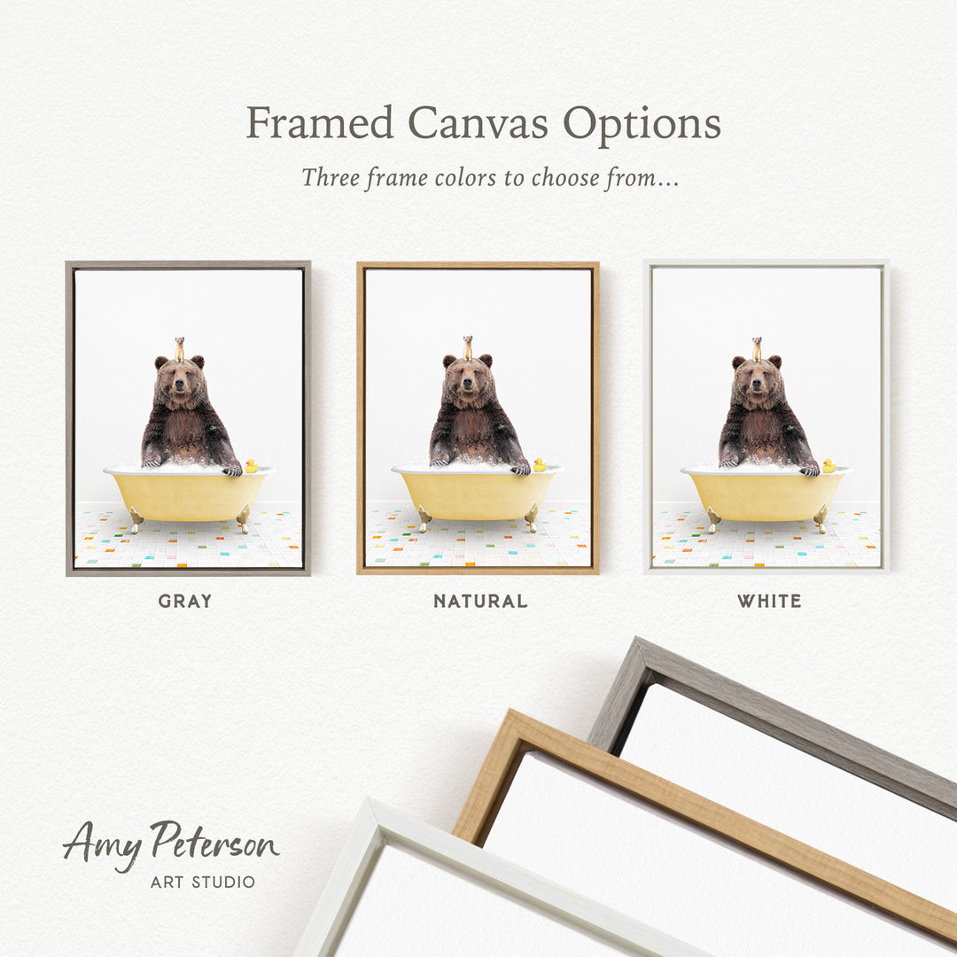 three framed canvas options, each featuring a bear sitting in a bathtub. The options include a gray frame, a natural frame, and a white frame.