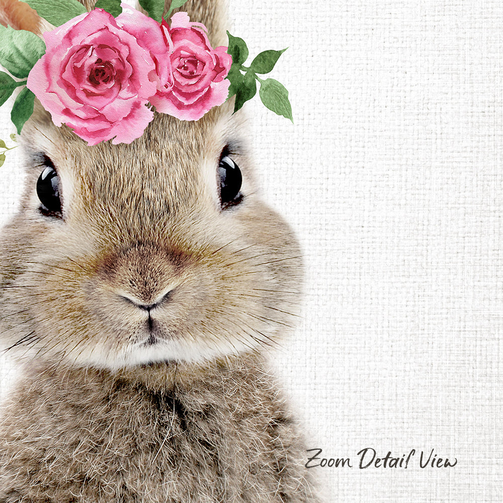 A close-up of a rabbit wearing a pink flower crown on its head, with its eyes looking directly at the camera.