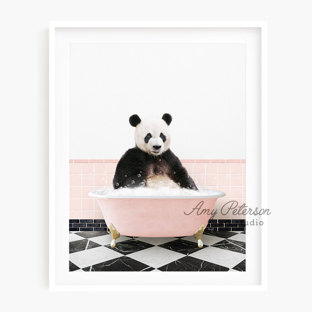 a panda bear sitting in a pink bath tub