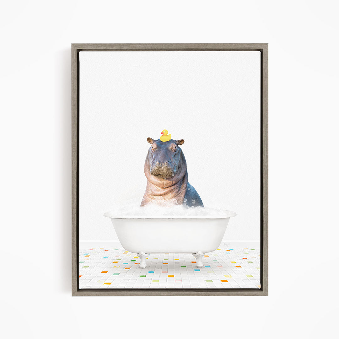 A hippopotamus sitting in a white bathtub, with a yellow rubber duck perched on its head.