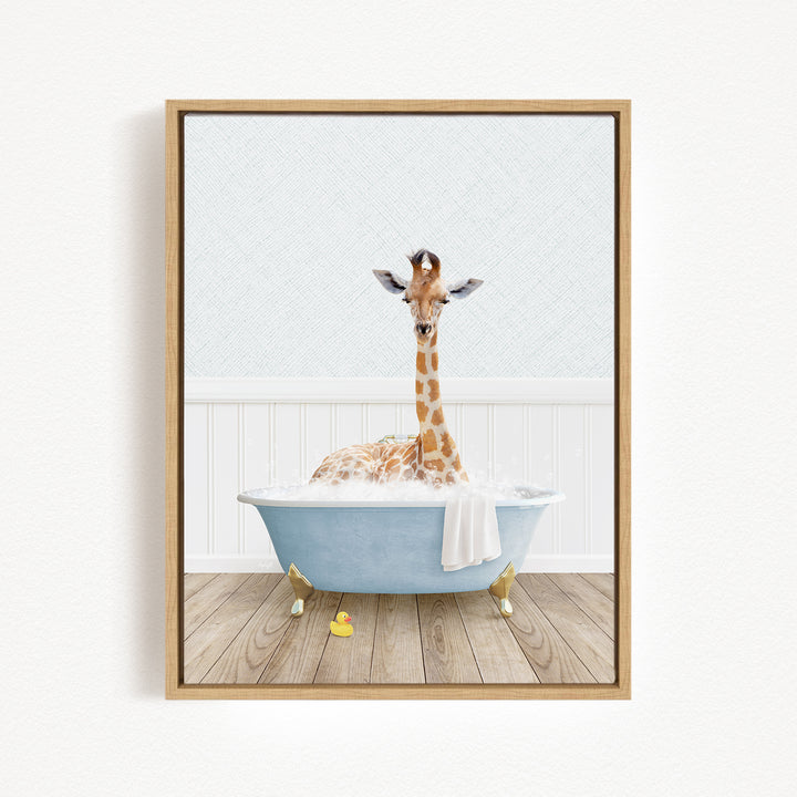 A giraffe is sitting in a blue bathtub filled with water, surrounded by a white wall and wooden floor.
