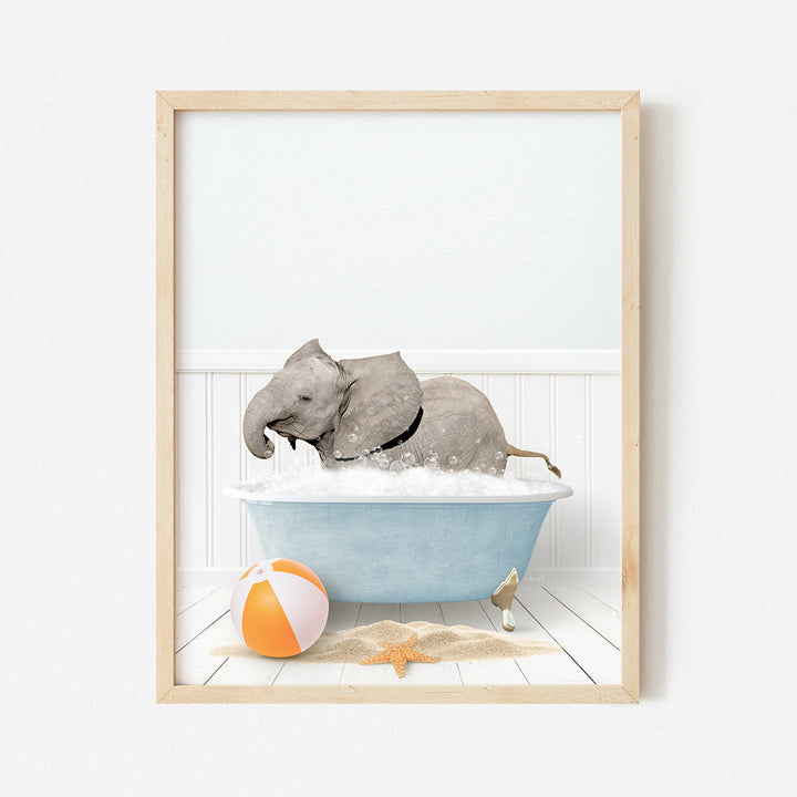 an elephant taking a bath in a blue bathtub