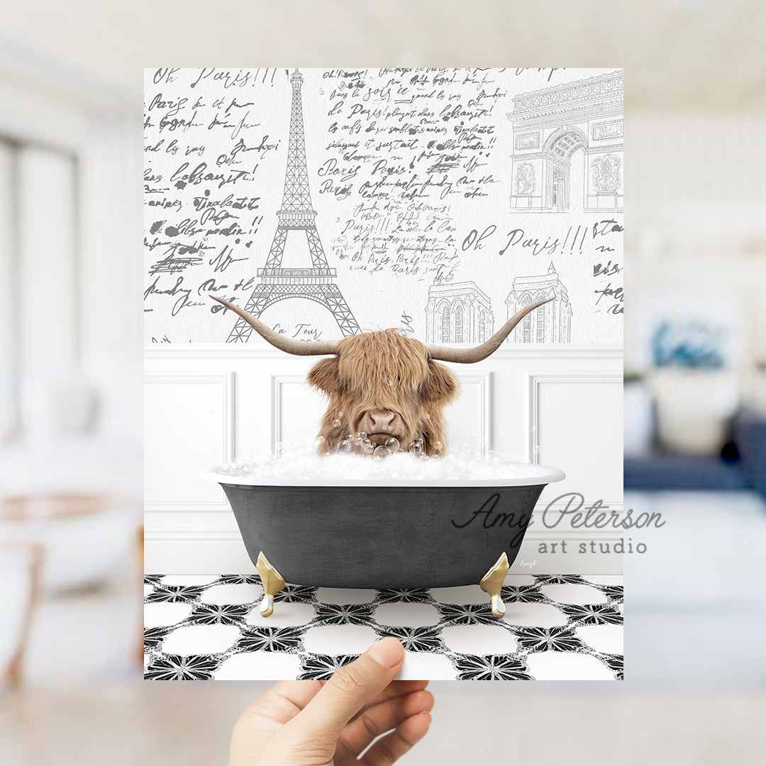 a person holding up a card with a picture of a cow in a bathtub