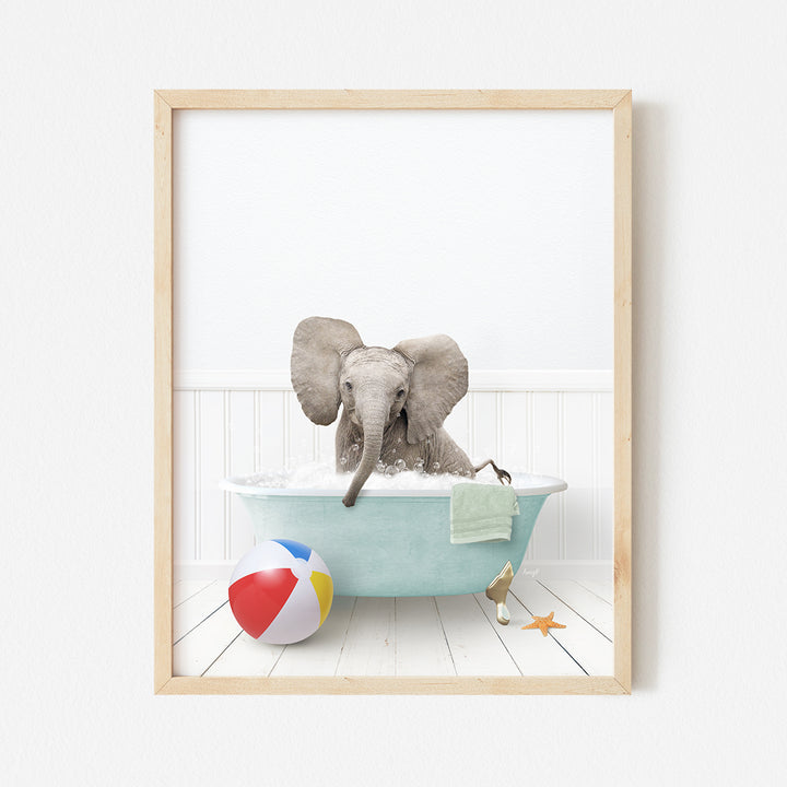 an elephant in a bathtub with a beach ball