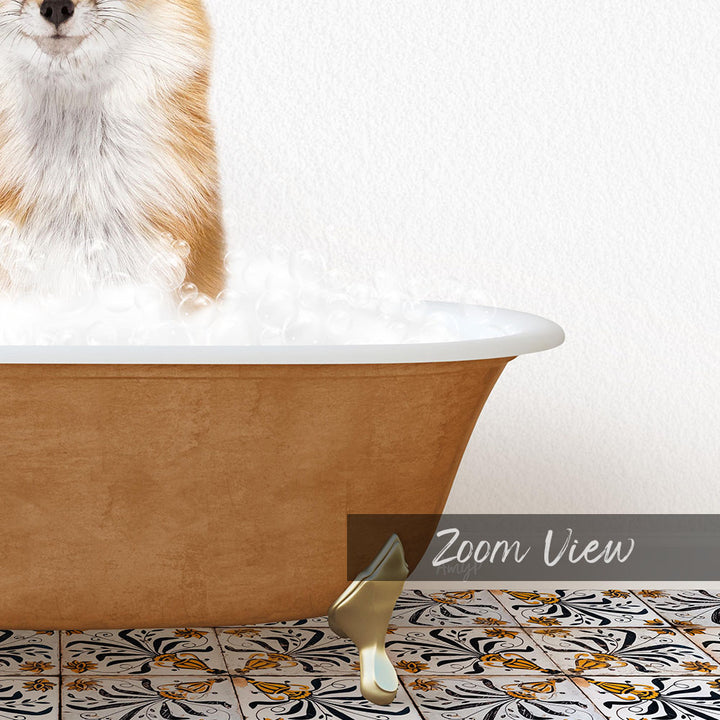 A fluffy orange and white cat is sitting in a bathtub filled with bubbles, with a gold bathtub faucet visible.