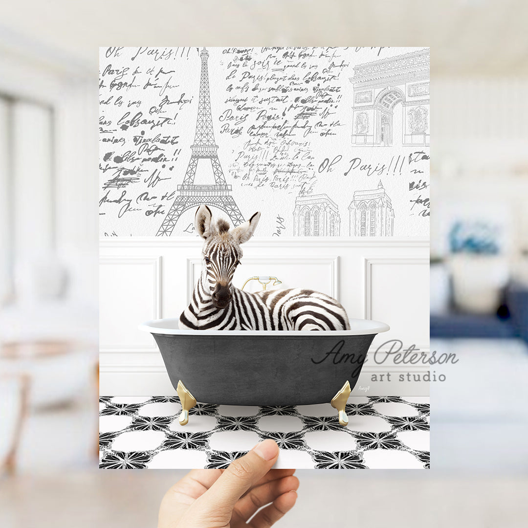 a person holding a card with a zebra in a bathtub