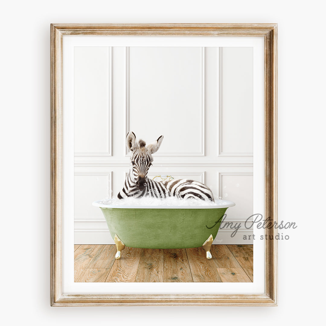 a zebra laying down in a green bath tub