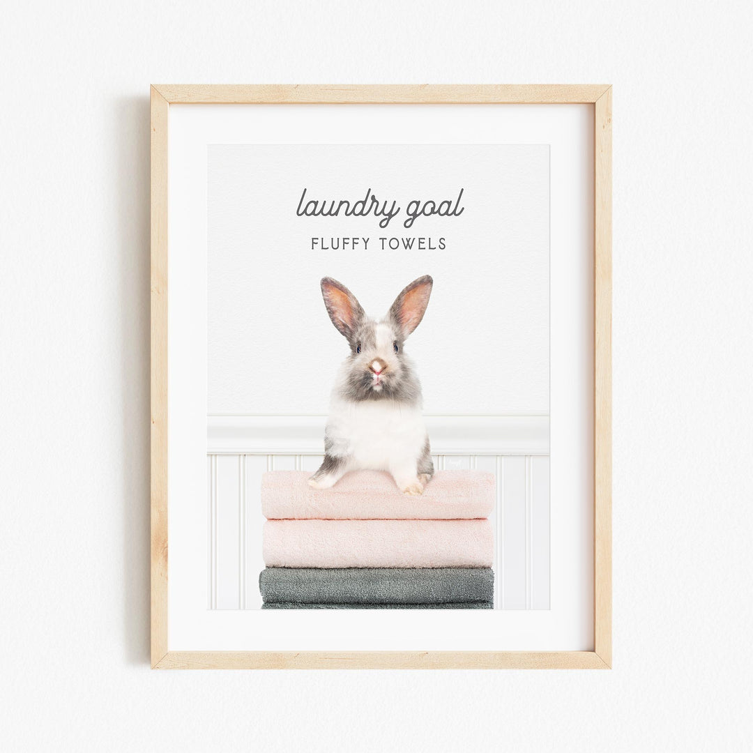 a picture of a bunny sitting on top of a towel