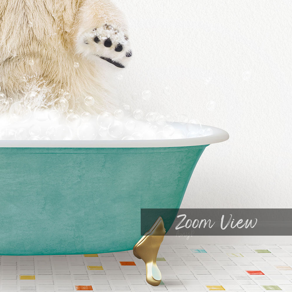 A fluffy white dog is standing in a teal bathtub filled with bubbles, with its paw raised in the air.