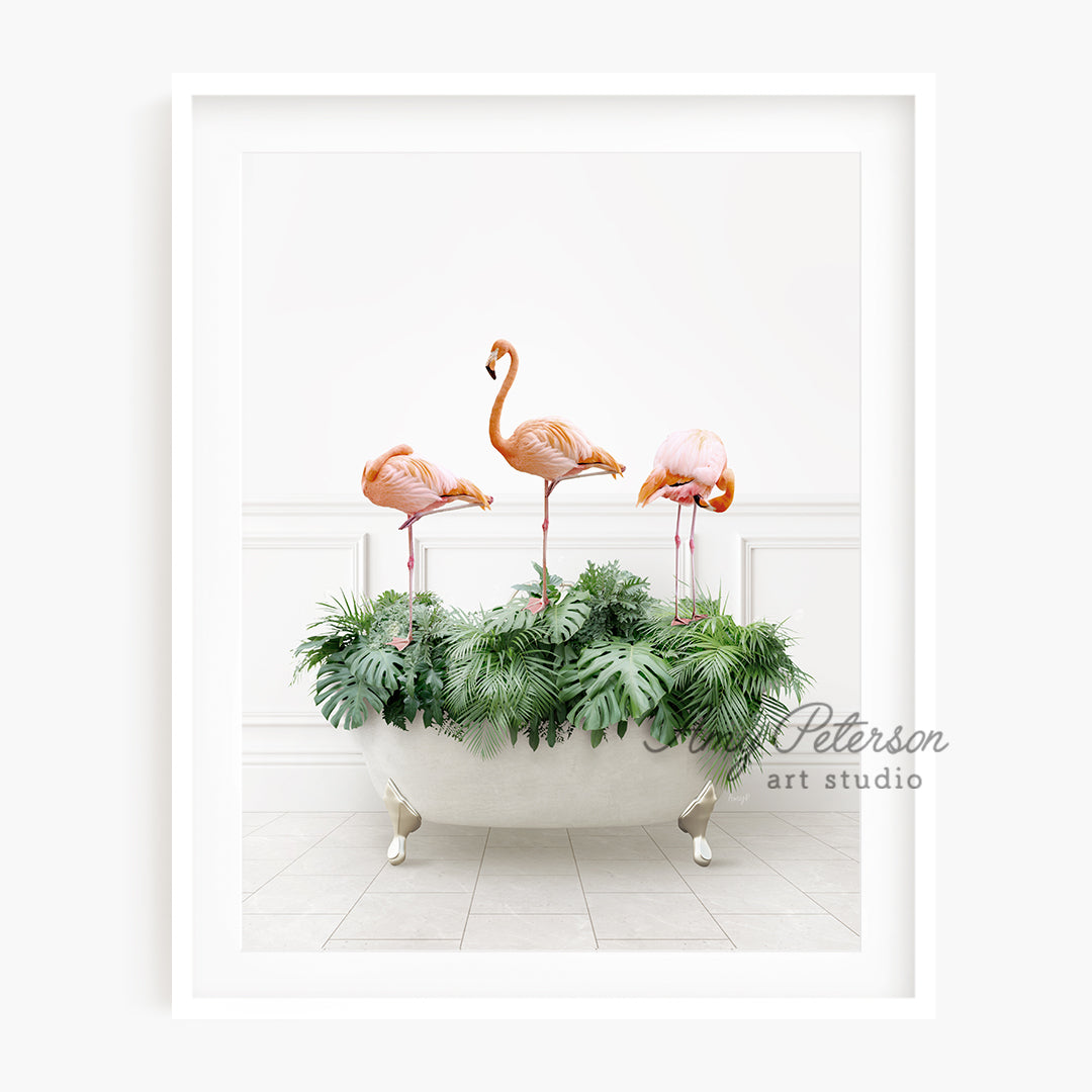 a group of pink flamingos sitting in a bathtub