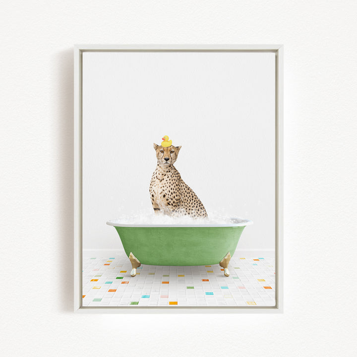 A cheetah wearing a yellow rubber duck hat is sitting in a green bathtub filled with bubbles, surrounded by a colorful tiled floor.