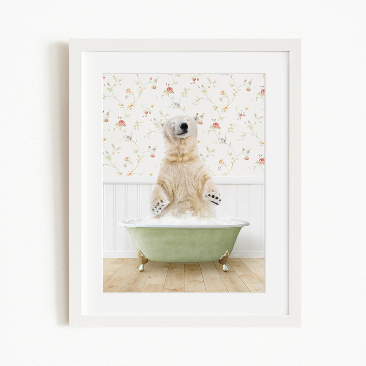 A polar bear standing in a green bathtub filled with water, with a floral wallpaper in the background.
