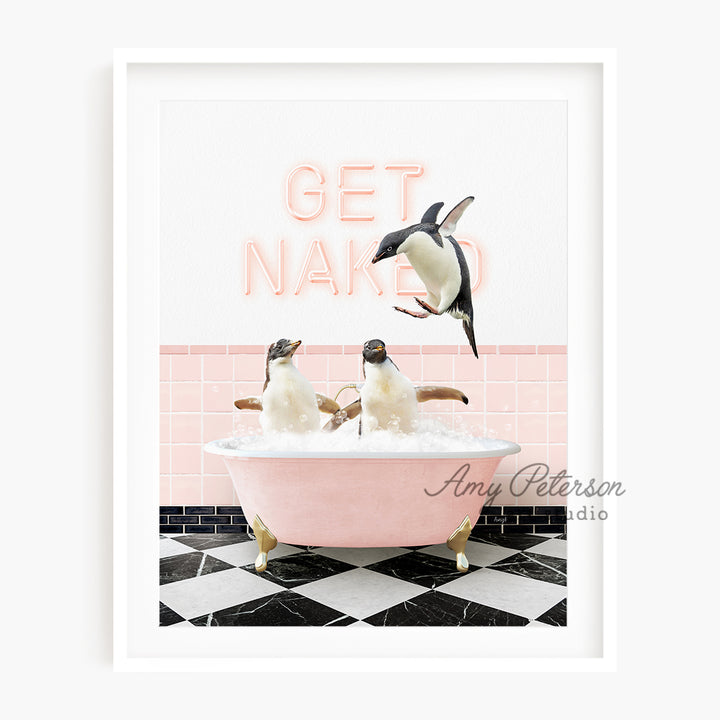 a pink bathtub with three penguins in it