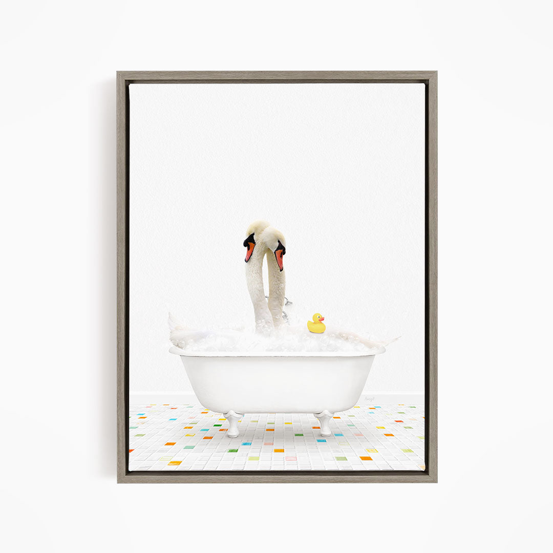 A white bathtub filled with bubbles, with two swans standing on the edge and a rubber duck floating in the water.
