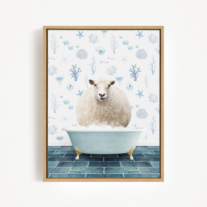 A sheep is sitting in a bathtub filled with bubbles, surrounded by a blue and white patterned wall.