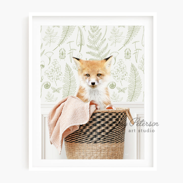 a picture of a fox sitting in a basket