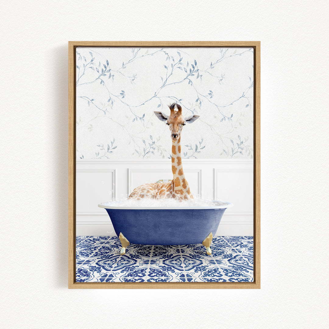 A giraffe sitting in a blue bathtub filled with water, surrounded by a blue and white patterned rug on the floor.
